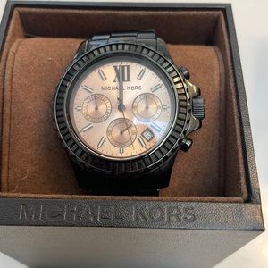 Black and Gold face Michael kors watch